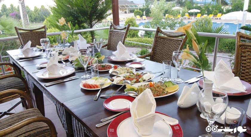 رستوران فضای باز  هتل رز رزیدنس بیچ